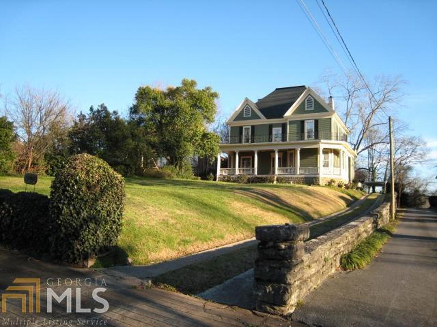 312 East 4th Street Rome, GA 30161 - Photo 1 of 1 a front view of a house with garden