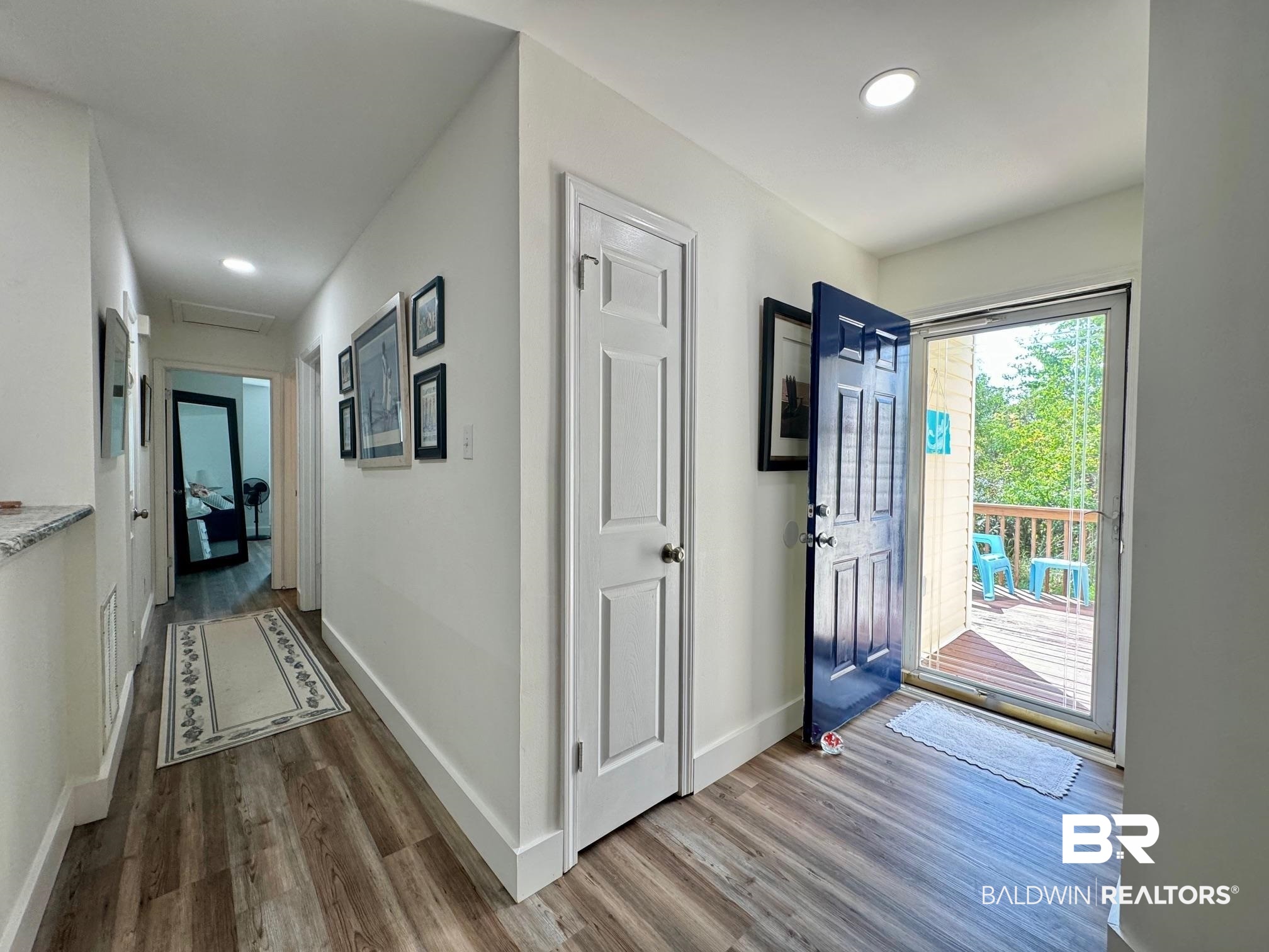 3200 Loop Road, Unit 55 Orange Beach, AL 36561 - Photo 21 of 40 Entrance foyer with dark hardwood / wood-style flooring
