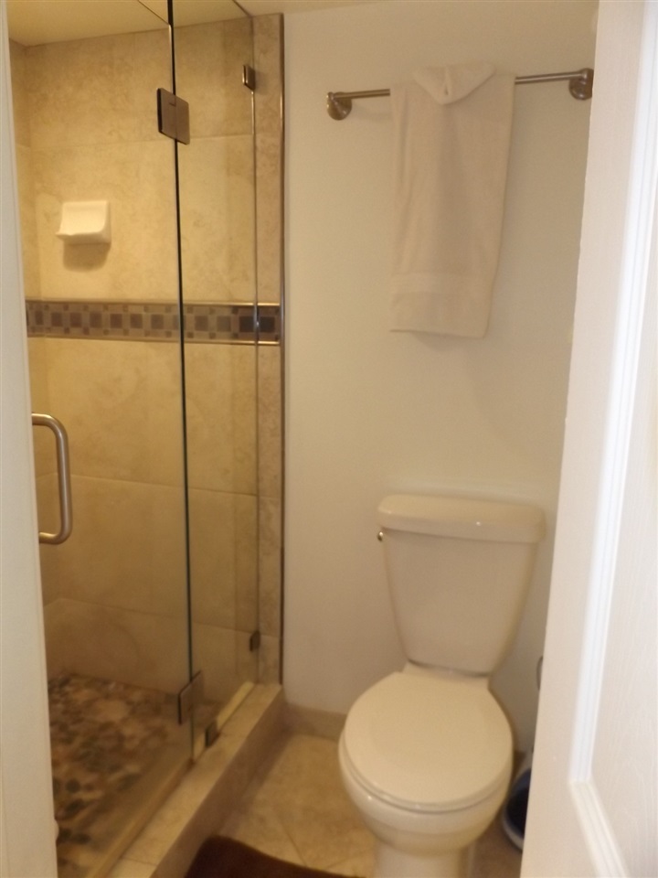 811 South Kihei Road, Unit 5F Kihei, HI 96753 - Photo 9 of 30 a bathroom with a toilet and a shower