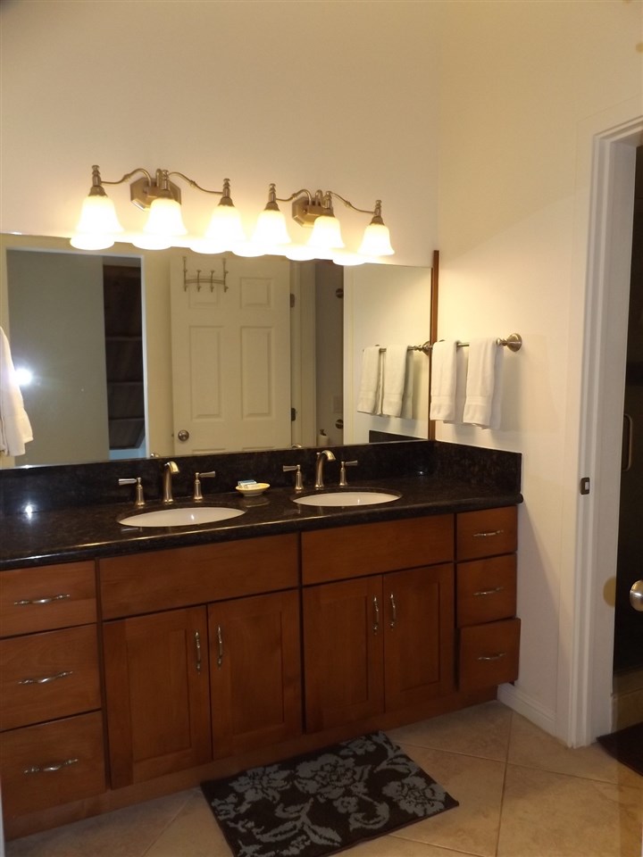 811 South Kihei Road, Unit 5F Kihei, HI 96753 - Photo 10 of 30 a bathroom with a sink and a mirror
