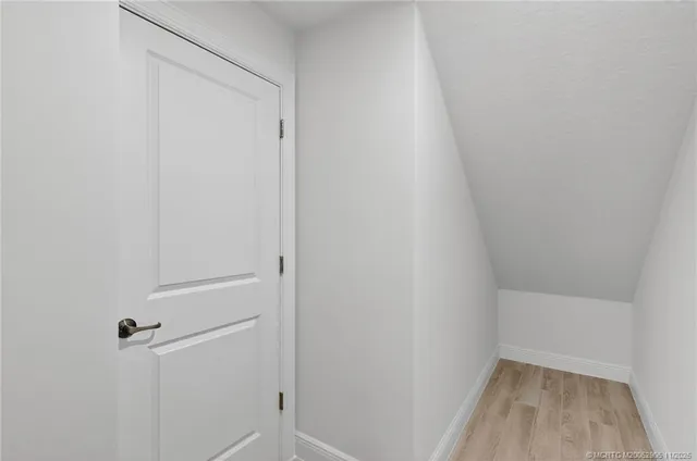 a view of a livingroom with wooden floor