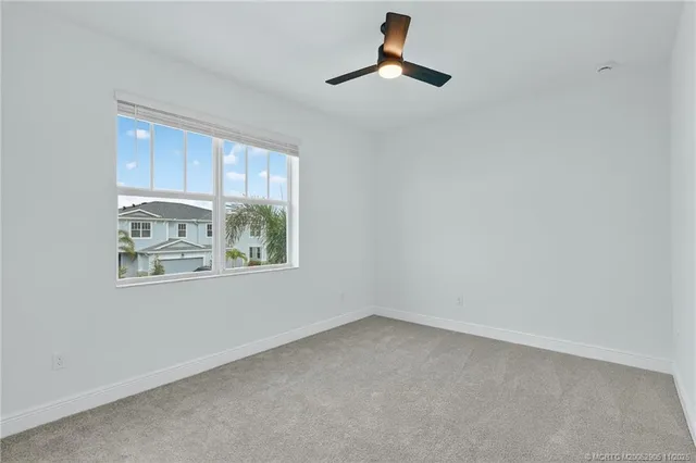 a view of a back yard of the house