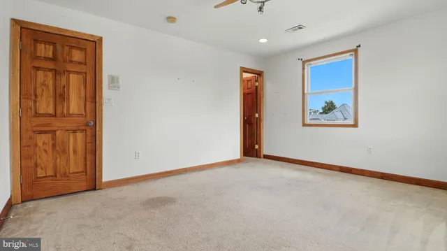 an empty room with windows