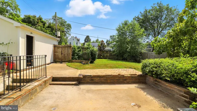 a room with furniture and wooden floor