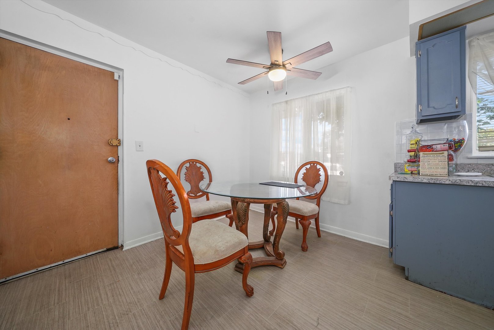 10340 South Pulaski Road, Unit 103 Oak Lawn, IL 60453 - Photo 12 of 30 a view of a dining room with furniture and wooden floor