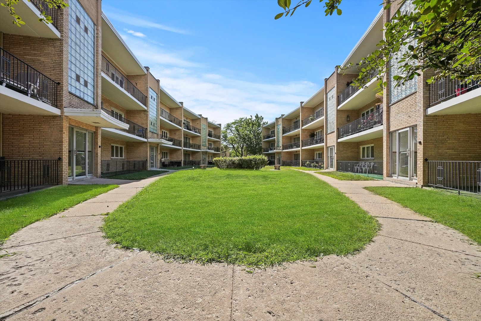 10340 South Pulaski Road, Unit 103 Oak Lawn, IL 60453 - Photo 22 of 30 a view of building with yard