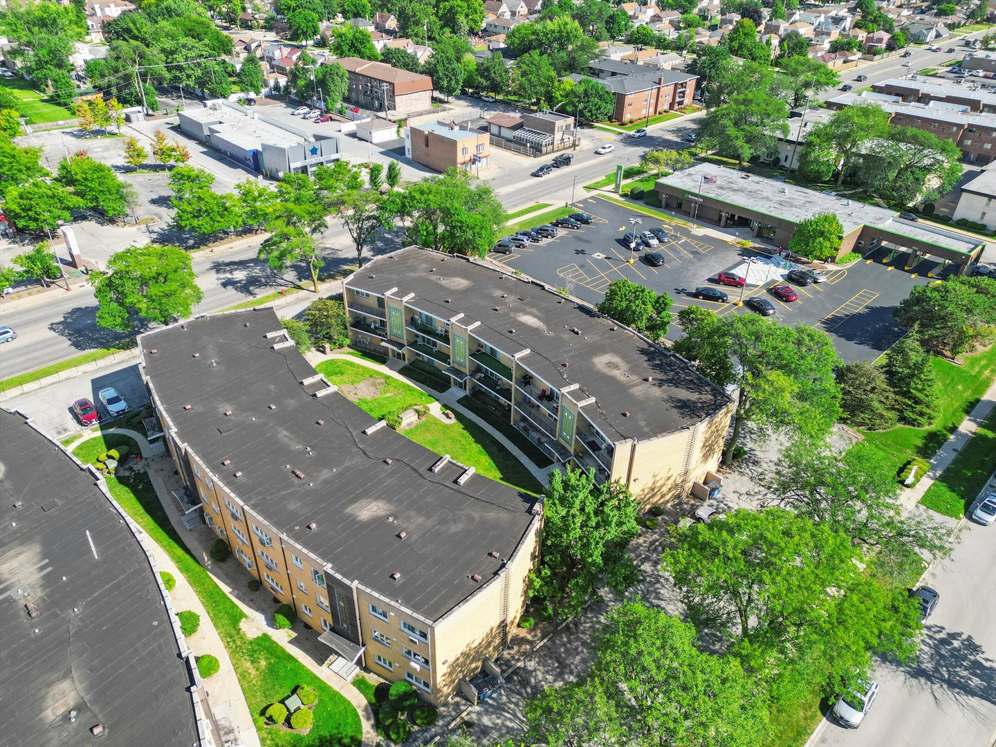 10340 South Pulaski Road, Unit 103 Oak Lawn, IL 60453 - Photo 24 of 30 an aerial view of a house with a swimming pool yard and outdoor seating