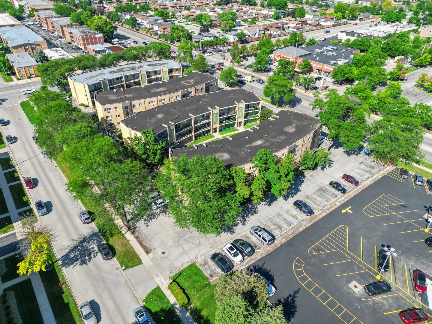 10340 South Pulaski Road, Unit 103 Oak Lawn, IL 60453 - Photo 26 of 30 an aerial view of multiple houses with yard