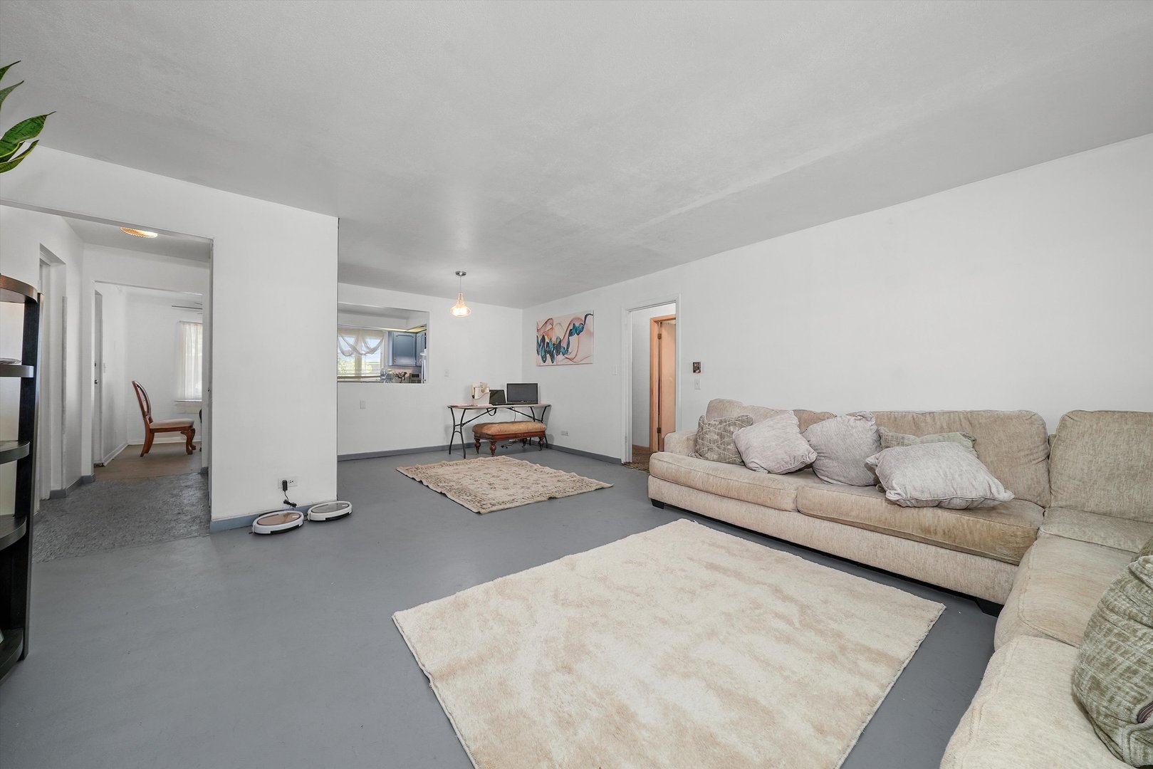 10340 South Pulaski Road, Unit 103 Oak Lawn, IL 60453 - Photo 5 of 30 a living room with furniture and a couch