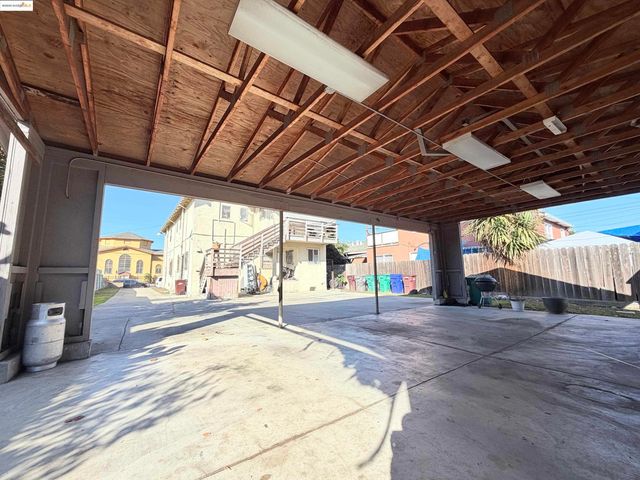 a view of a hall with wooden floor