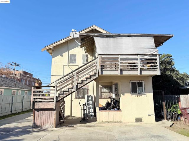 a view of a building with a street