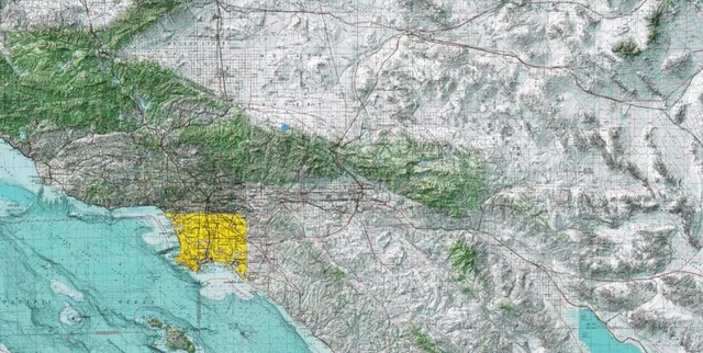 a aerial view of a house with a yard and garden