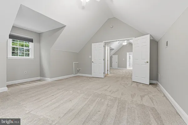 a view of a livingroom with a ceiling fan