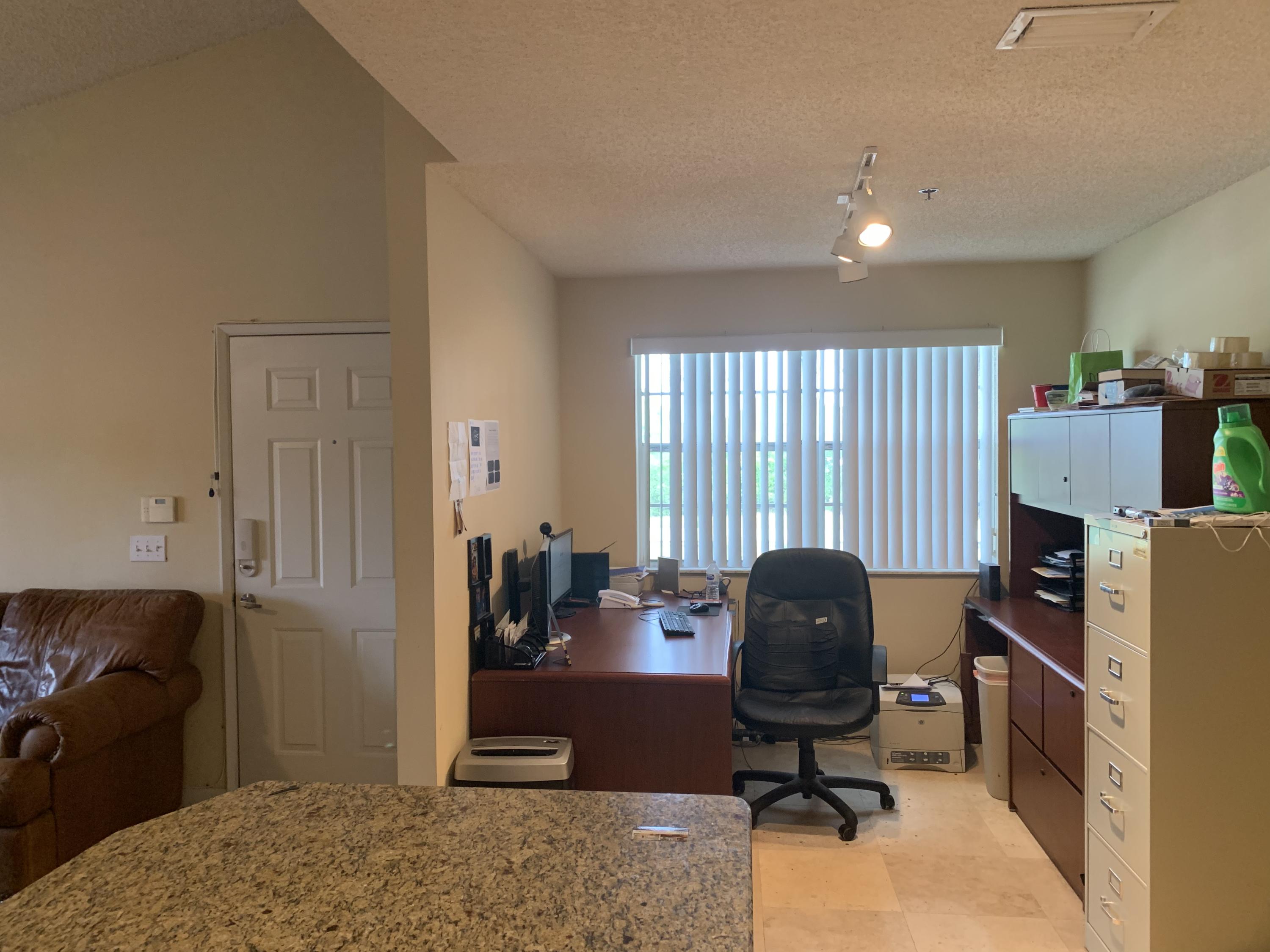 3279 Clint Moore Road, Unit 201 Boca Raton, FL 33496 - Photo 11 of 27 a workspace with furniture and a window