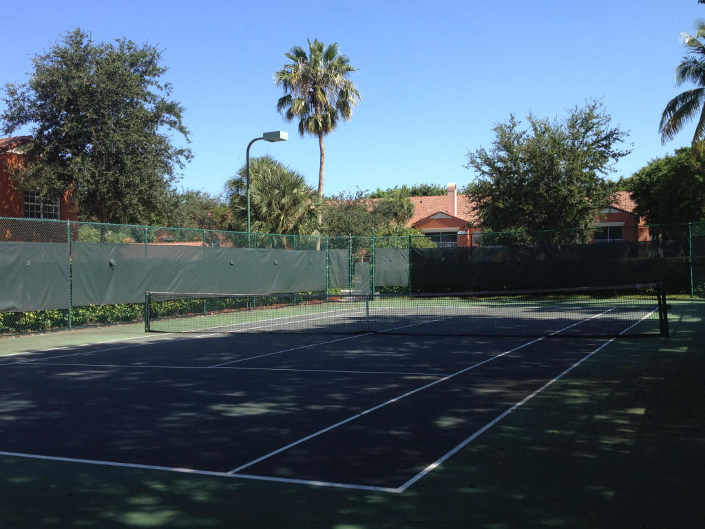 3279 Clint Moore Road, Unit 201 Boca Raton, FL 33496 - Photo 20 of 27 a view of a tennis court