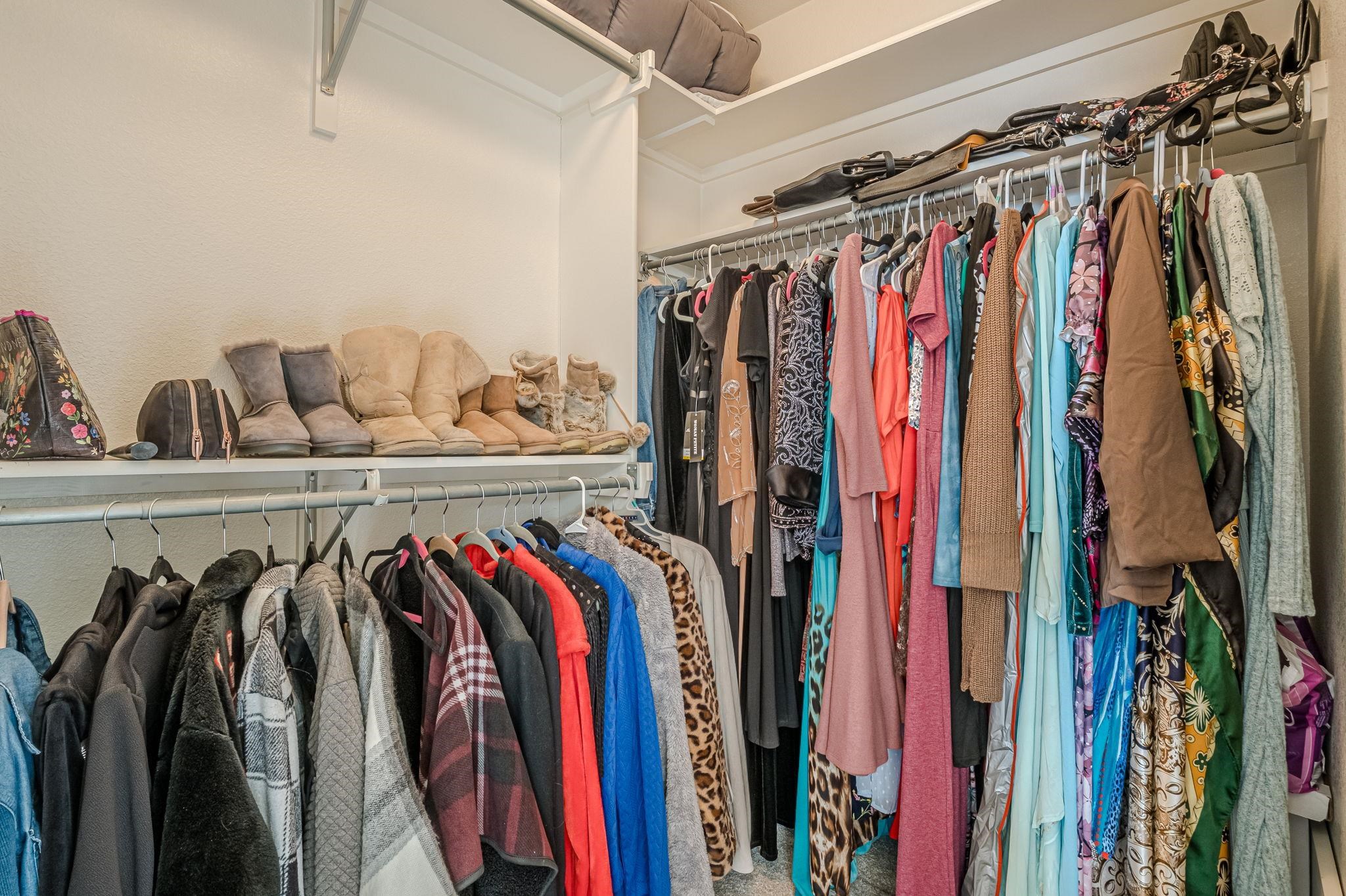 3153 Forrest Way Grand Junction, CO 81504 - Photo 23 of 42 a view of walk in closet with clothes