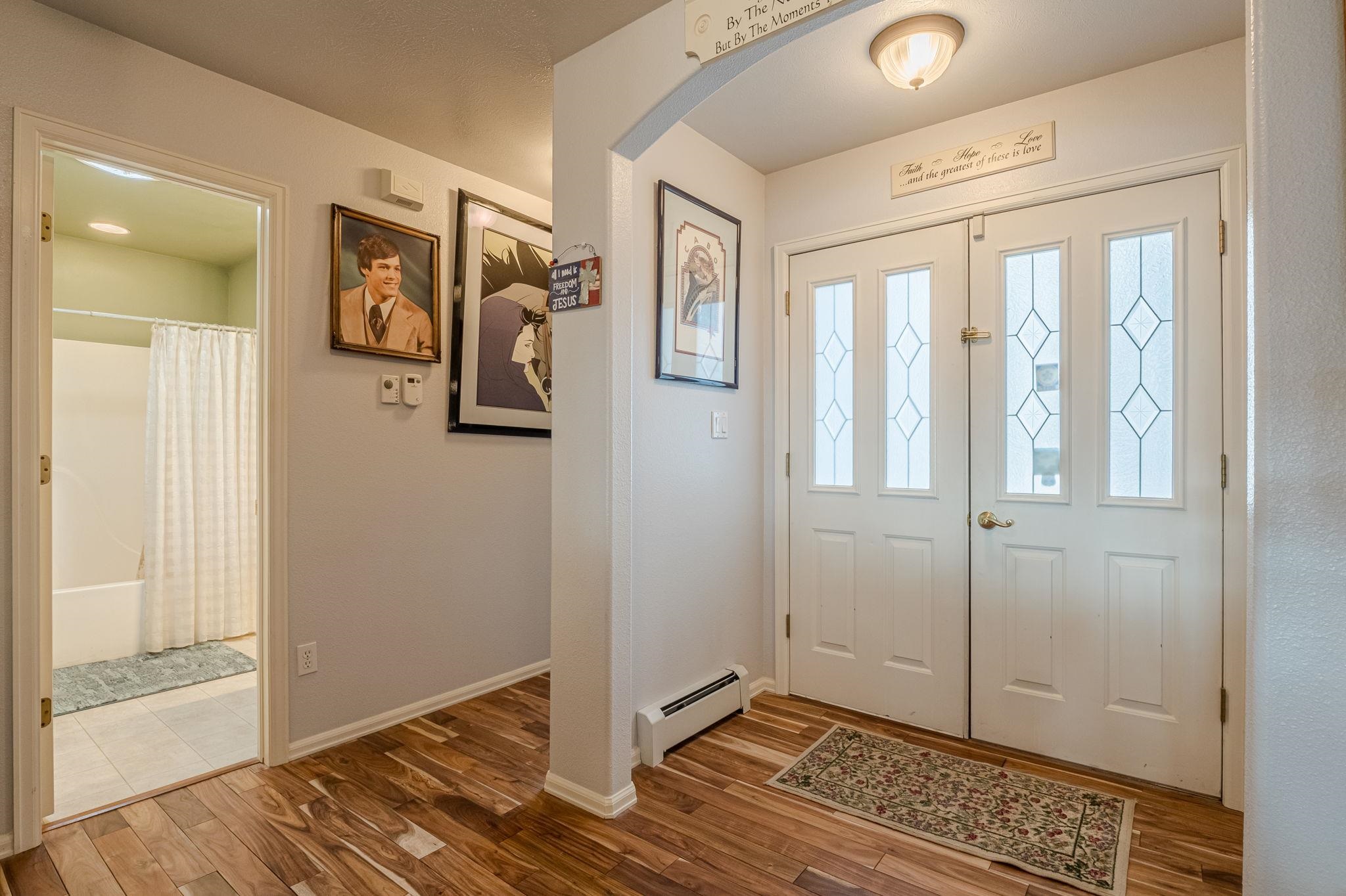 3153 Forrest Way Grand Junction, CO 81504 - Photo 30 of 42 a view of entryway with wooden floor