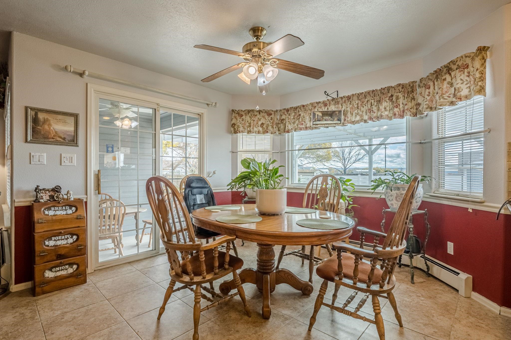 3153 Forrest Way Grand Junction, CO 81504 - Photo 7 of 42 a dining room with furniture and window