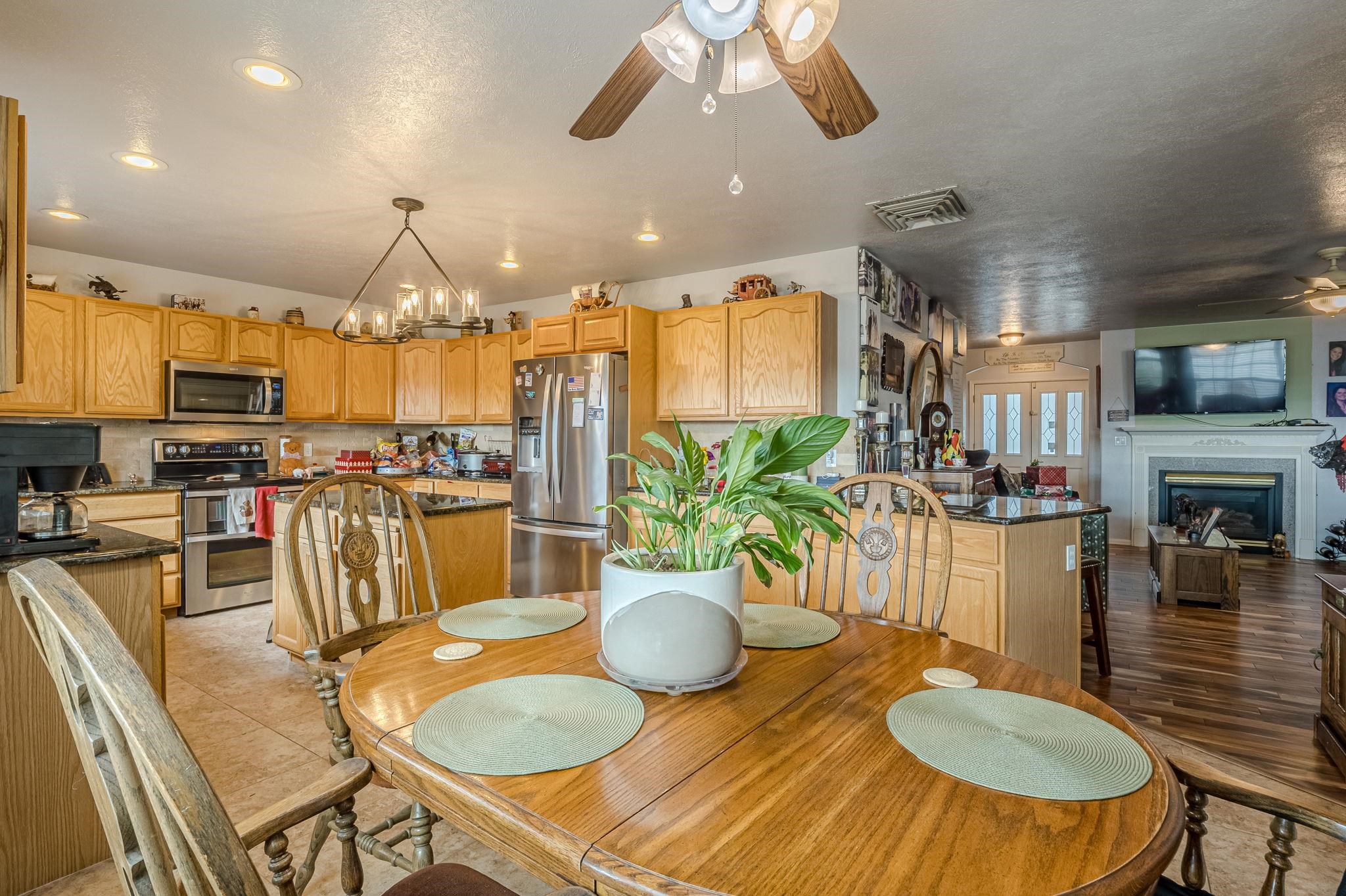 3153 Forrest Way Grand Junction, CO 81504 - Photo 9 of 42 a kitchen with a table and chairs