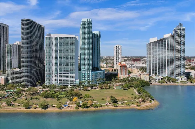 a view of a city with tall buildings