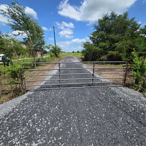 a view of lake with green space