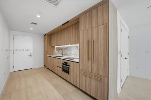 an empty room with glass door