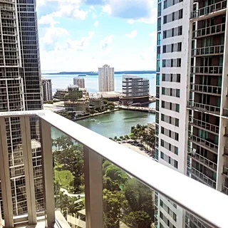 a view of a balcony with city view