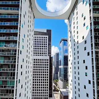 a view of swimming pool with outdoor seating and plants