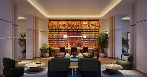 a view of lobby with furniture and large windows