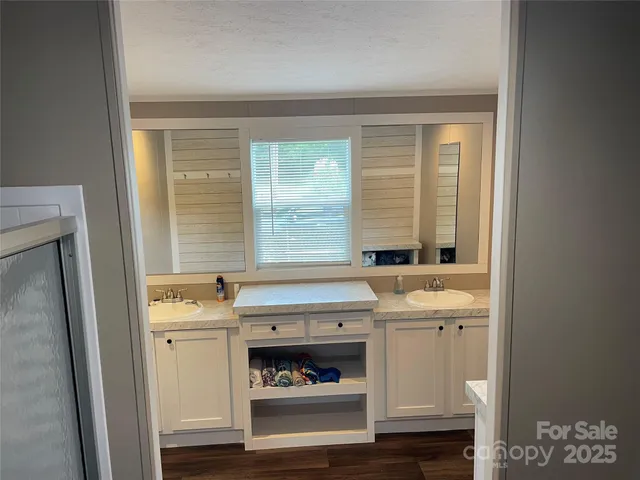 a kitchen with a stove and a window
