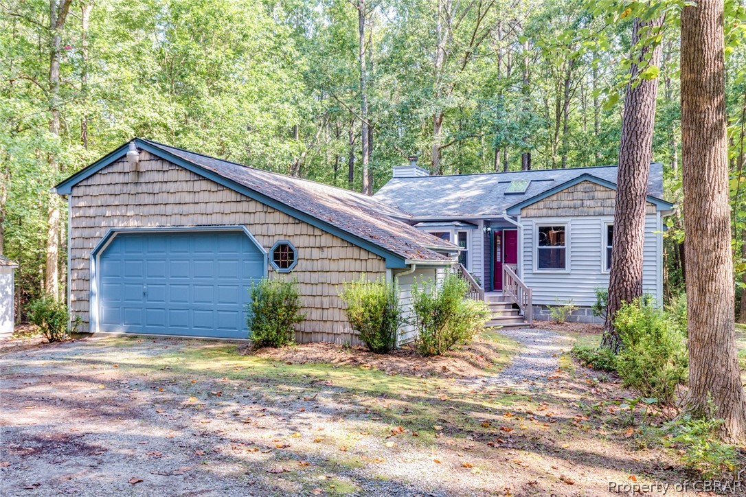 Privacy abounds in this move-in ready, low maintenance ranch home located on over 5 wooded acres.