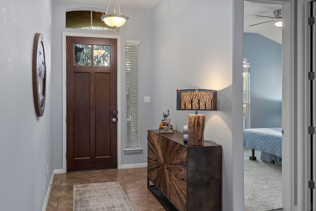 2902 Tempe Drive Cedar Park, TX 78641 - Photo 6 of 38 Entryway featuring ceiling fan and baseboards