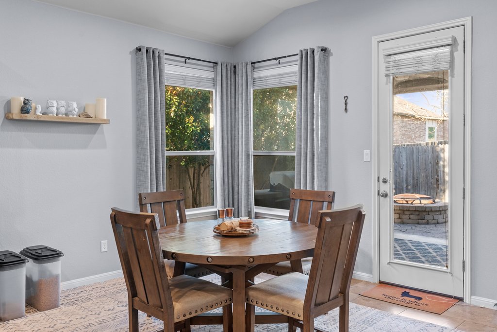 2902 Tempe Drive Cedar Park, TX 78641 - Photo 10 of 38 Dining space featuring lofted ceiling and light tile patterned floors