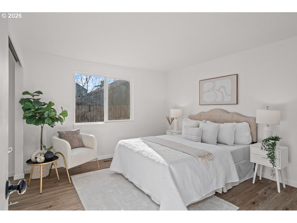 4482 Southwest 179th Avenue Beaverton, OR 97078 - Photo 17 of 37 a bedroom with a bed and a couch