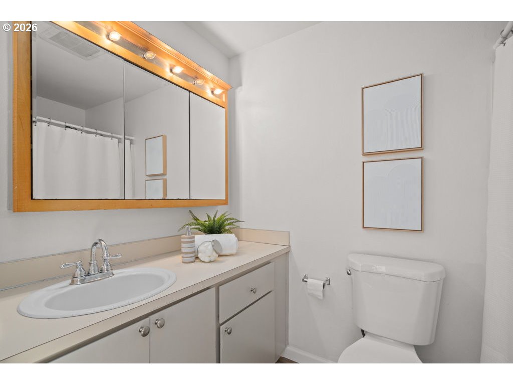 4482 Southwest 179th Avenue Beaverton, OR 97078 - Photo 21 of 37 a bathroom with a sink and a mirror