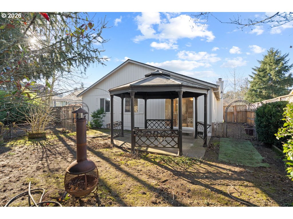 4482 Southwest 179th Avenue Beaverton, OR 97078 - Photo 26 of 37 a backyard of a house with yard barbeque oven and outdoor seating