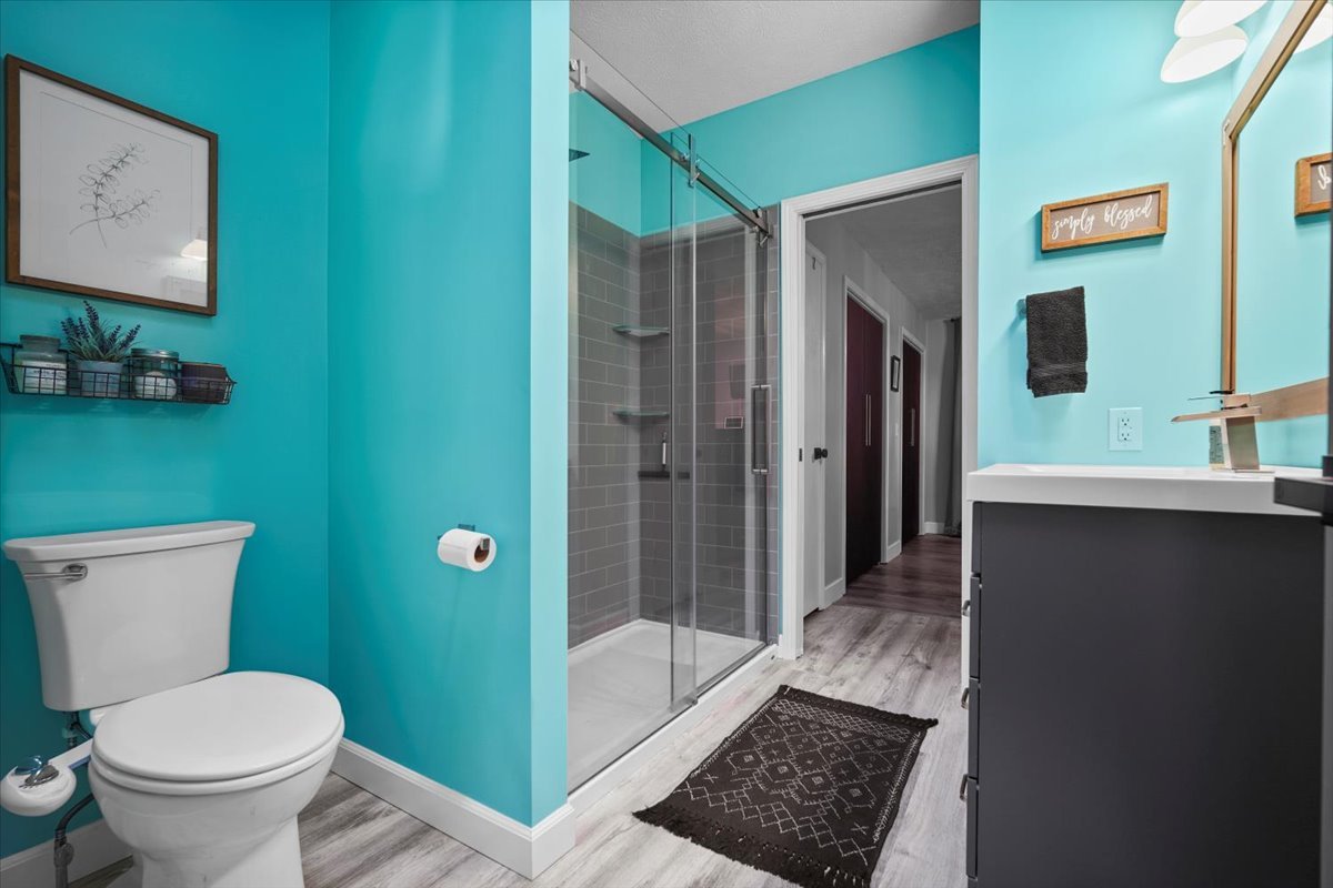 2719 Arrowhead Drive Bloomington, IL 61704 - Photo 12 of 26 a bathroom with a toilet and a sink