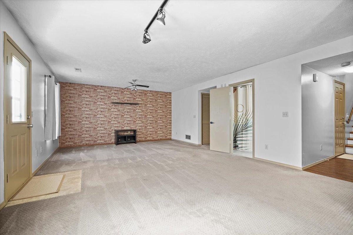 2719 Arrowhead Drive Bloomington, IL 61704 - Photo 17 of 26 a view of empty room with windows