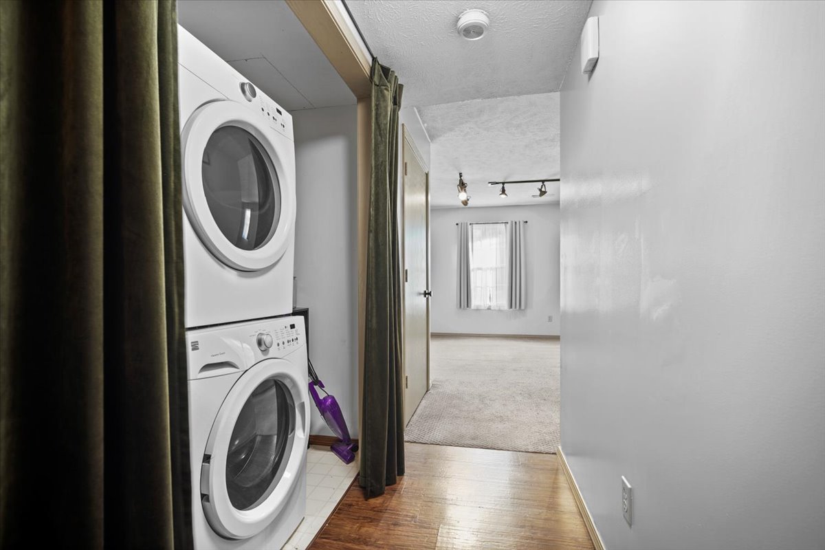 2719 Arrowhead Drive Bloomington, IL 61704 - Photo 20 of 26 a view of a hallway with washer and dryer