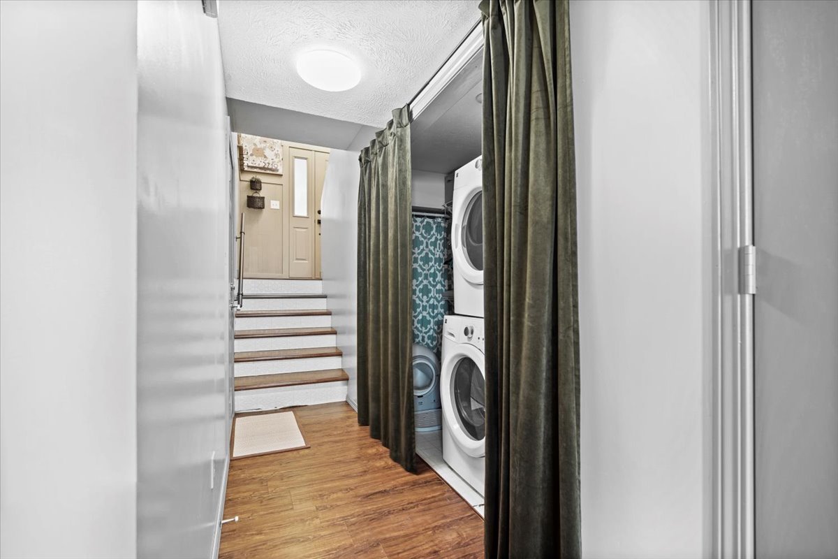 2719 Arrowhead Drive Bloomington, IL 61704 - Photo 21 of 26 a view of a hallway with washer and dryer