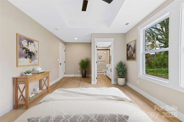a bathroom with a double vanity sink toilet and shower