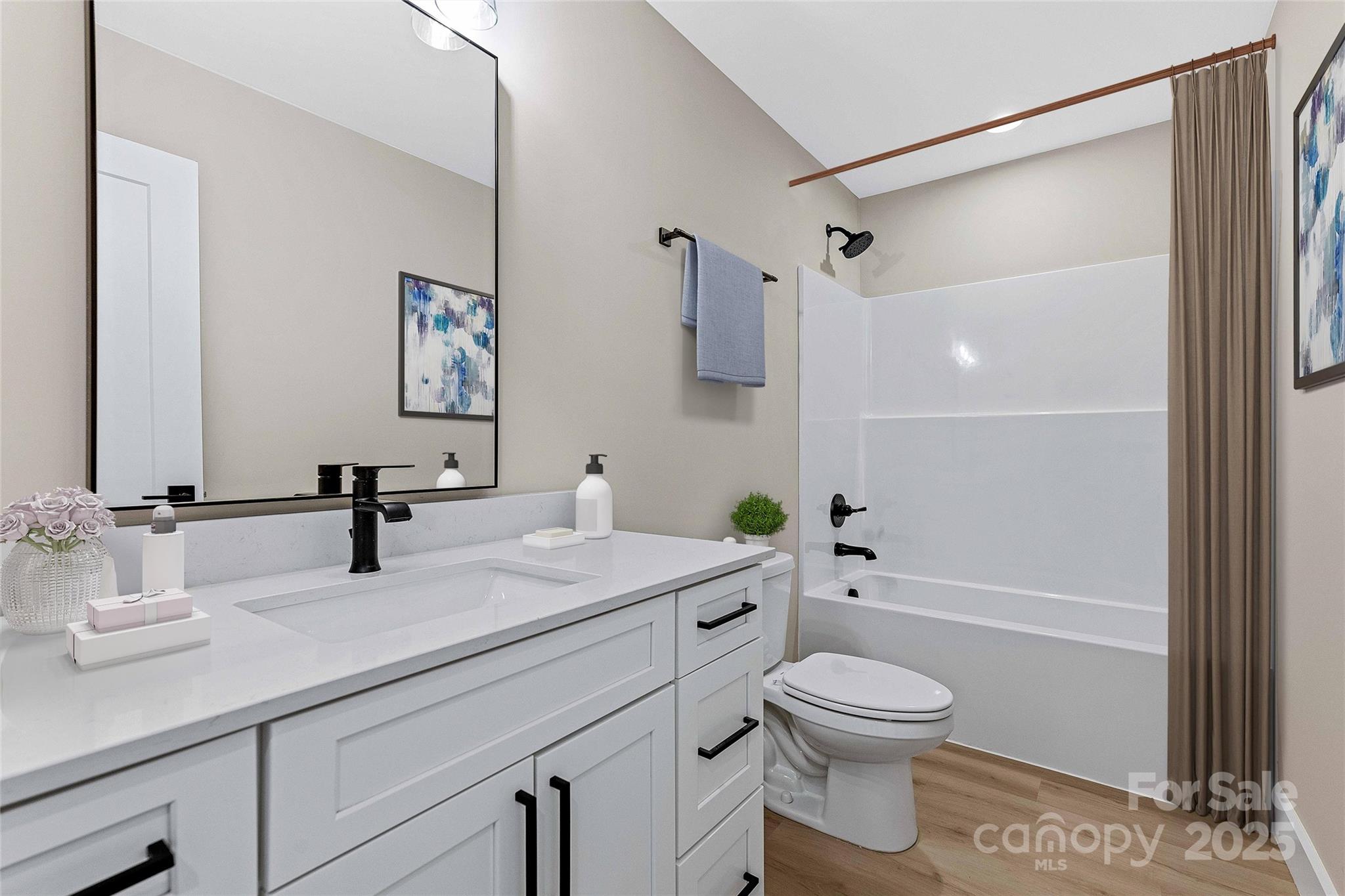 74 Ridge Way Marion, NC 28752 - Photo 42 of 45 a bathroom with a sink a toilet and shower