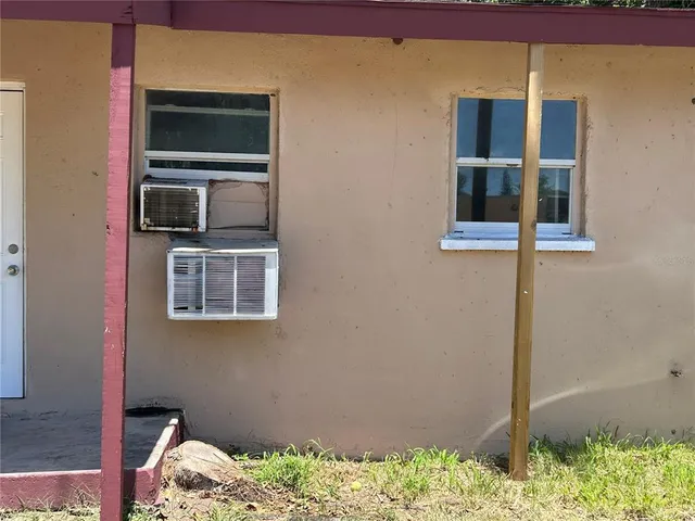 a living room with a bed