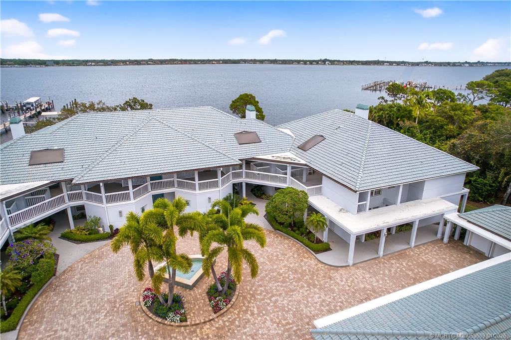 12500 Harbour Ridge Boulevard, Unit 48 Palm City, FL 34990 - Photo 21 of 28 a aerial view of a house with plants