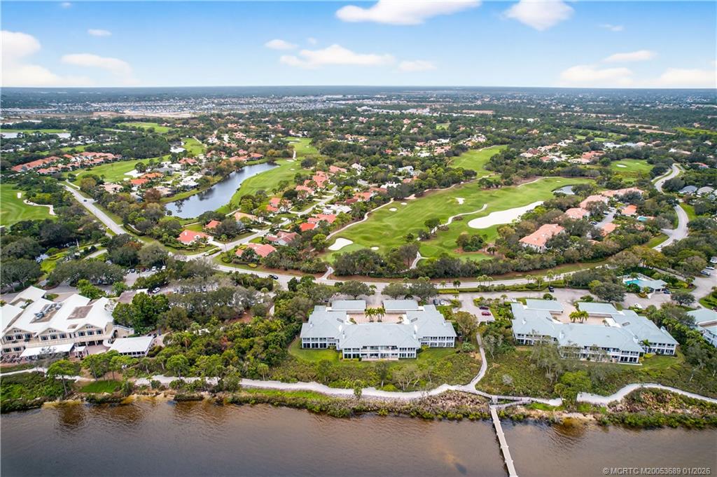 12500 Harbour Ridge Boulevard, Unit 48 Palm City, FL 34990 - Photo 24 of 28 an aerial view of a city