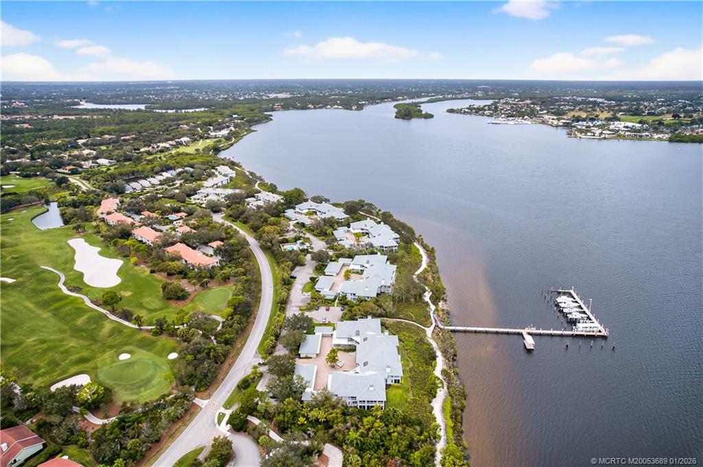 12500 Harbour Ridge Boulevard, Unit 48 Palm City, FL 34990 - Photo 28 of 28 an aerial view of a residential houses with outdoor space and seating