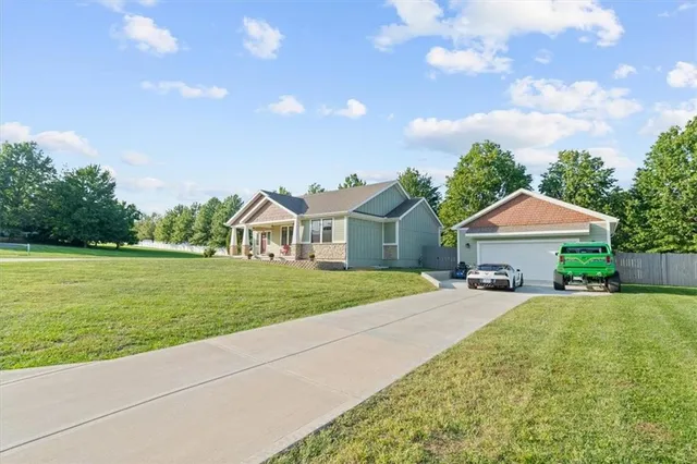 $680,000 | 408 Northwest Rust Court, Grain Valley, MO 64029