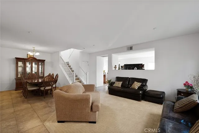 a living room with furniture and a couch