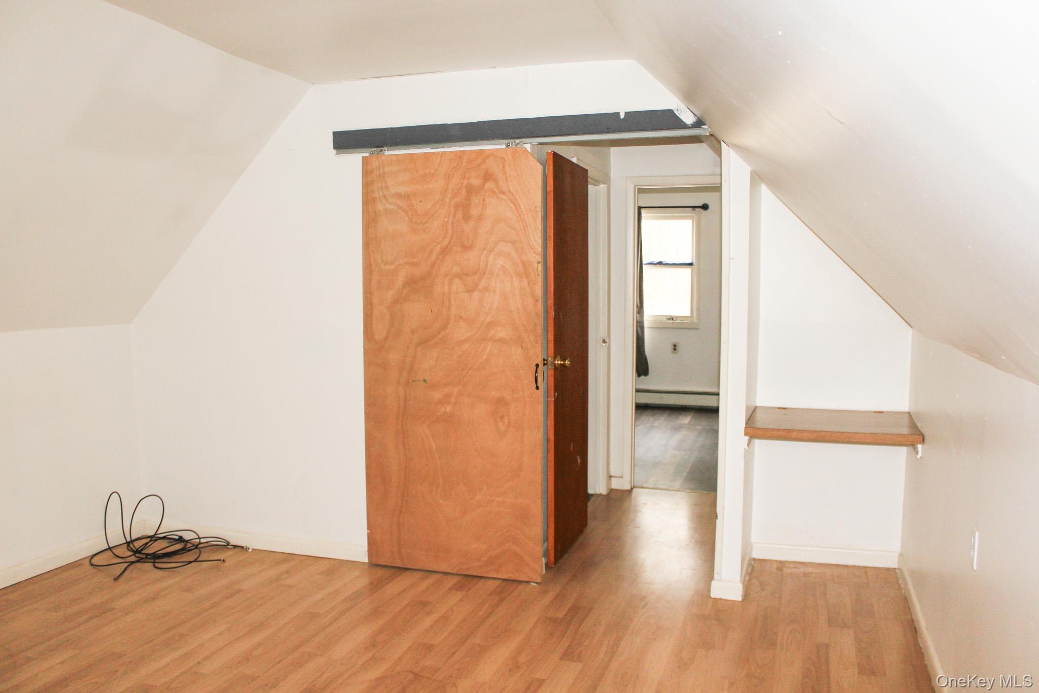 29 Schultz Road White Lake, NY 12786 - Photo 13 of 24 a view of empty room with wooden floor and fan
