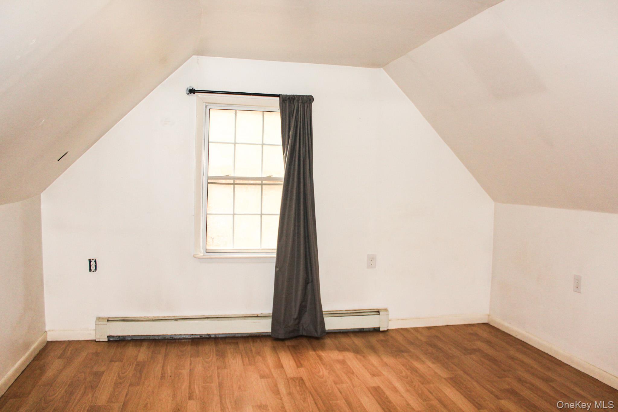 29 Schultz Road White Lake, NY 12786 - Photo 14 of 24 an empty room with wooden floor and windows